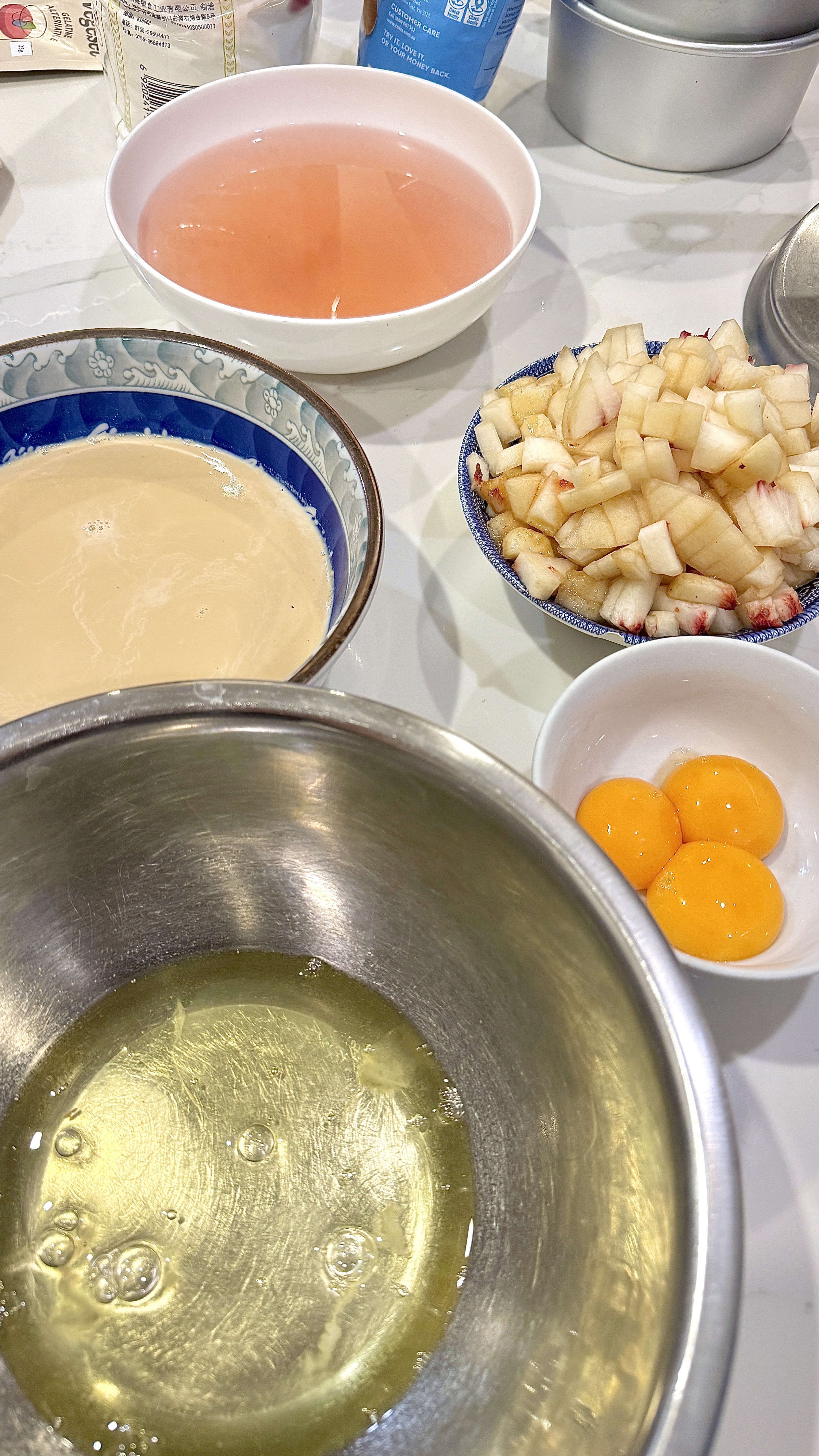 Ingredients laid out — peaches, oolong tea, eggs
